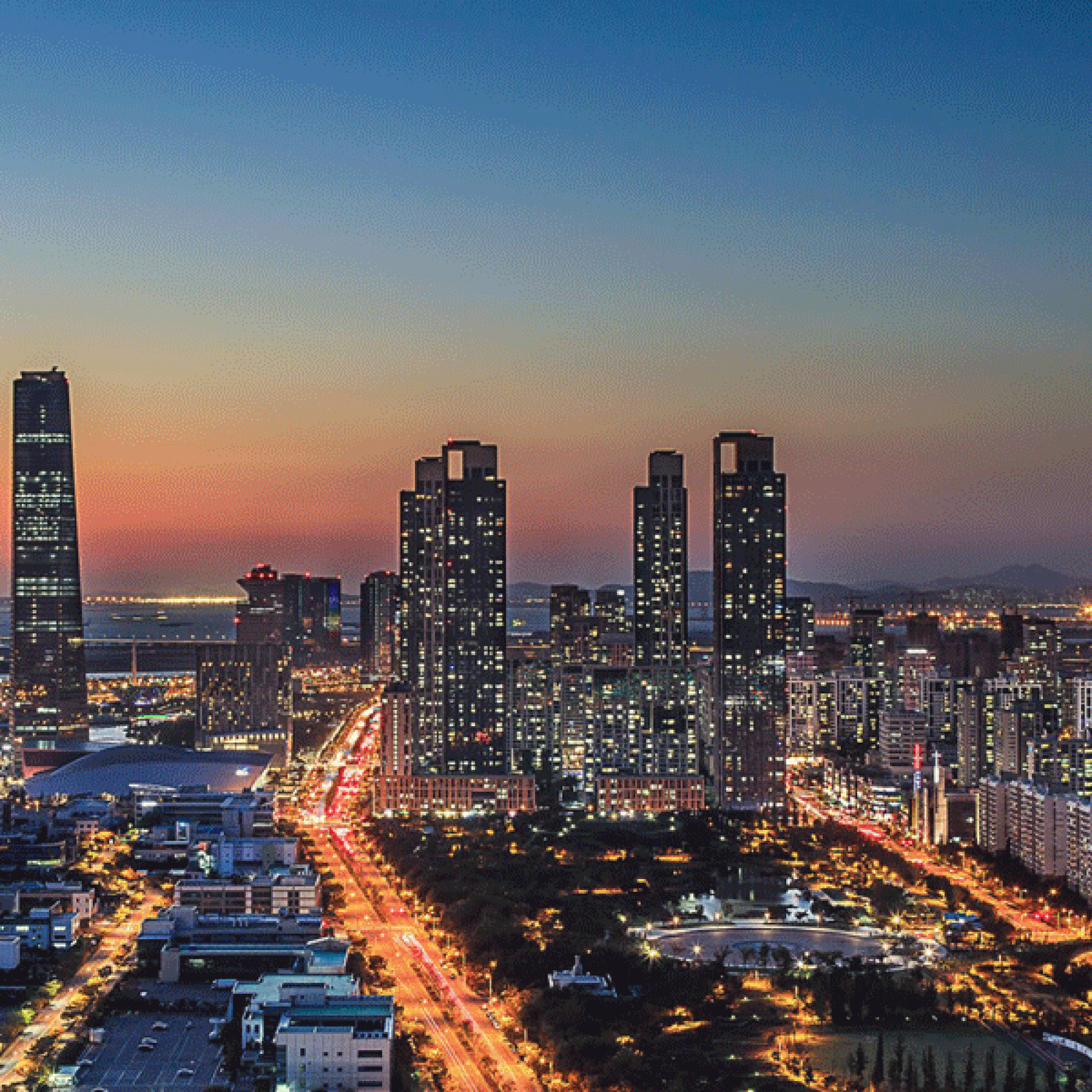 Die Stadt Songdo bei Dämmerung.