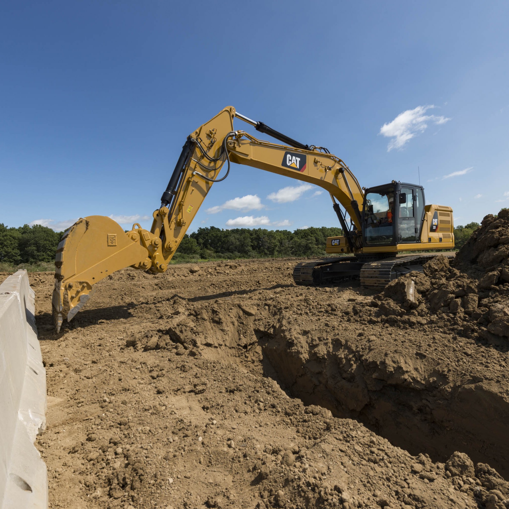 Die Systemfunktion «E-Fence» ermöglicht beim Cat 320 die Begrenzung des Schwenkbereichs. Der Maschinist kann den Schwenkradius festlegen, bei dem der Baggerarm automatisch gestoppt wird. 