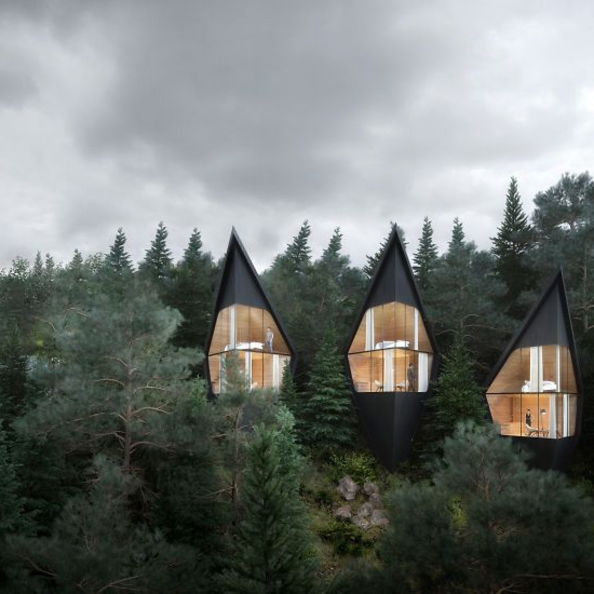Das neuste Projekt von Peter Pichler Architecture beinhaltet schwarz eingefärbte Baumhäuser in den italienischen Dolomiten.