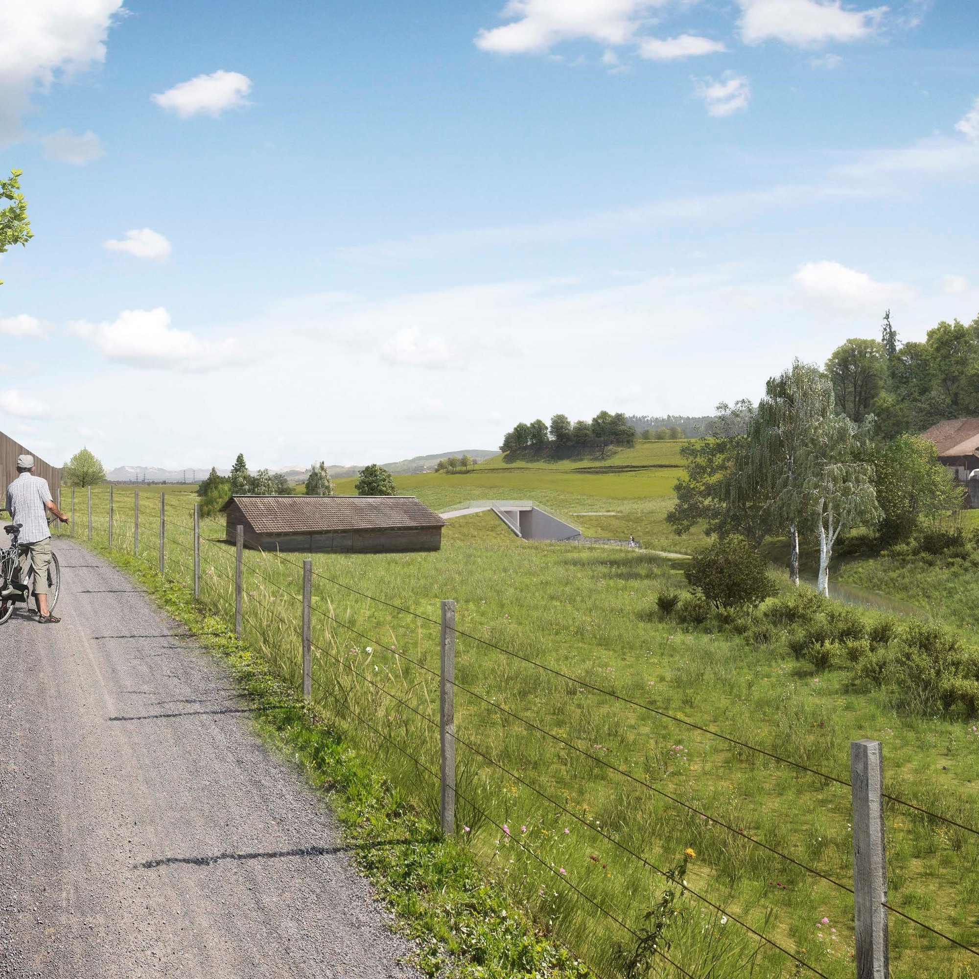 Blick vom Mühleweg Staffelbach auf die Luftseite des Dammbauwerks.